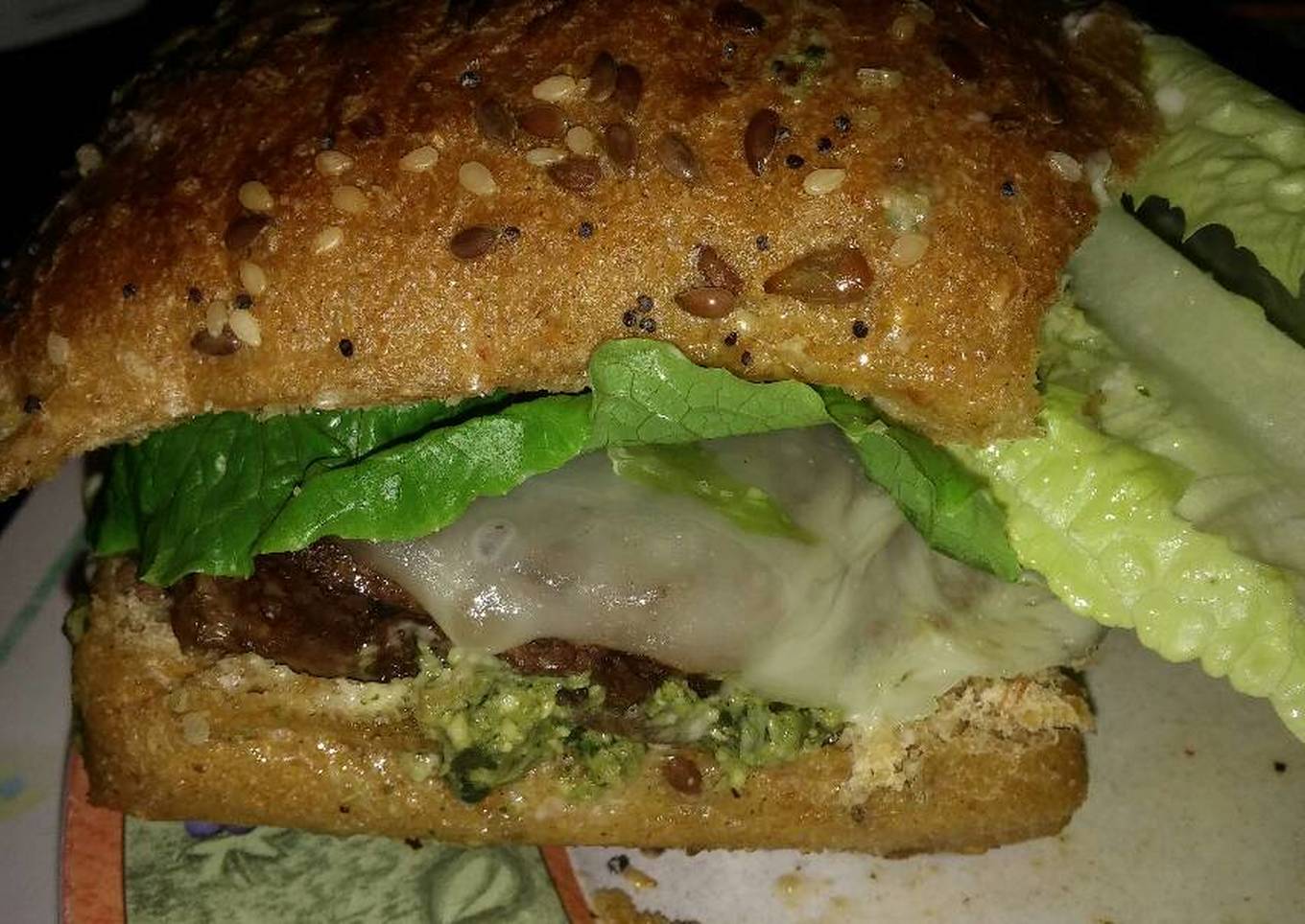 michaels flg finger licking good angus beef and basil pesto cheeseburger with provolone and sun dried tomatoes