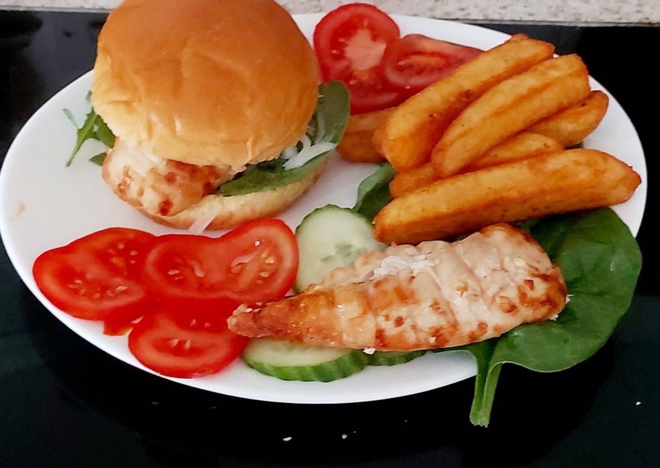 my roast chicken burger with homemade chips and salad