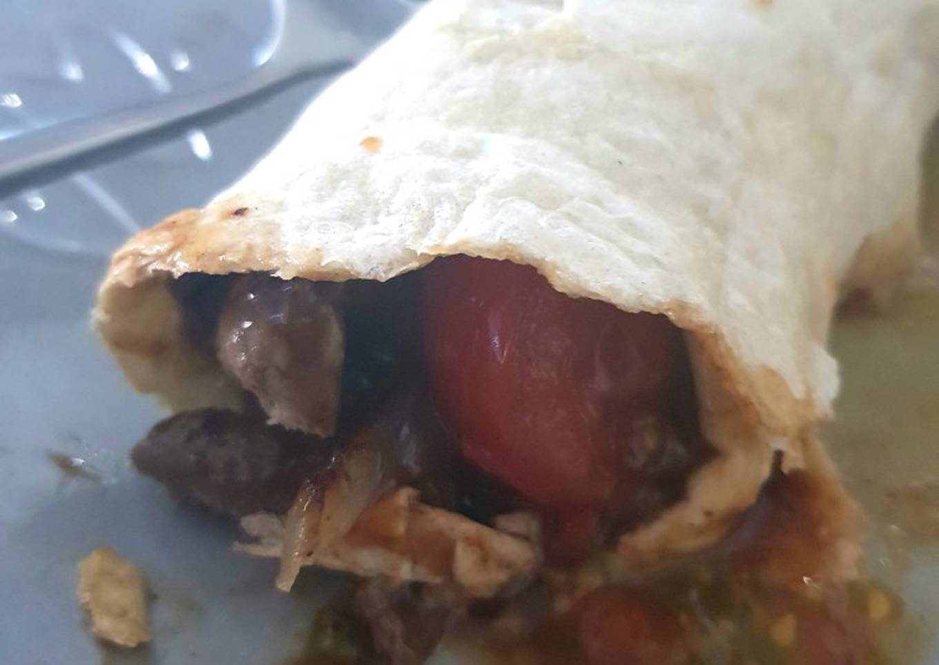 my steak onion wrap with a tennessee whisky beef sauce