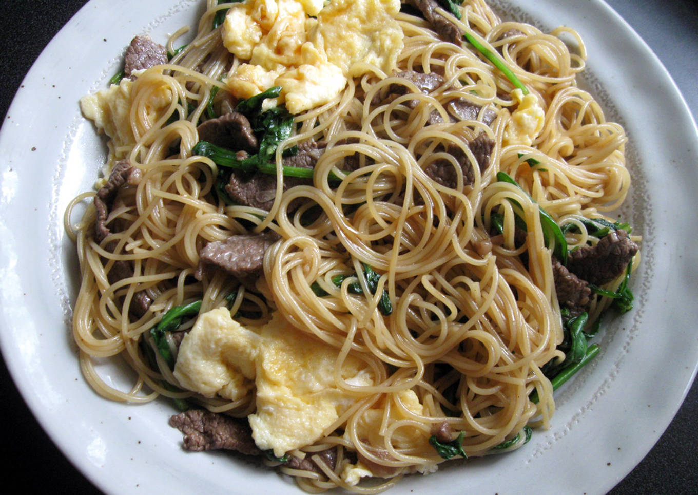 stir fried somen or capellini with beef spinach egg