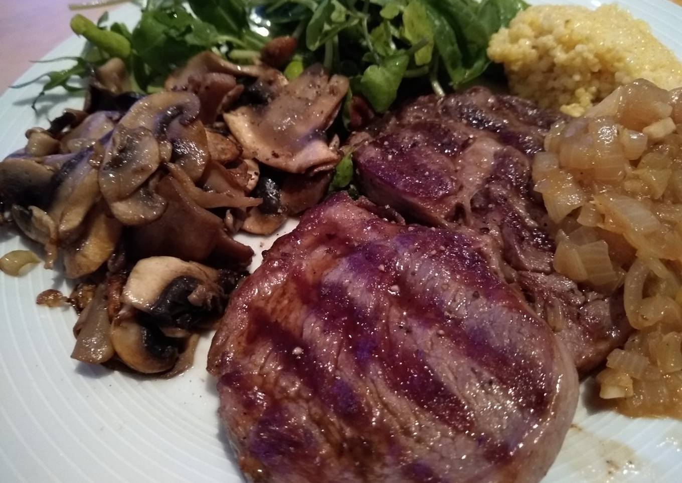 Ribeye Steak with Onion Gravy, Mushrooms & Fresh Greens