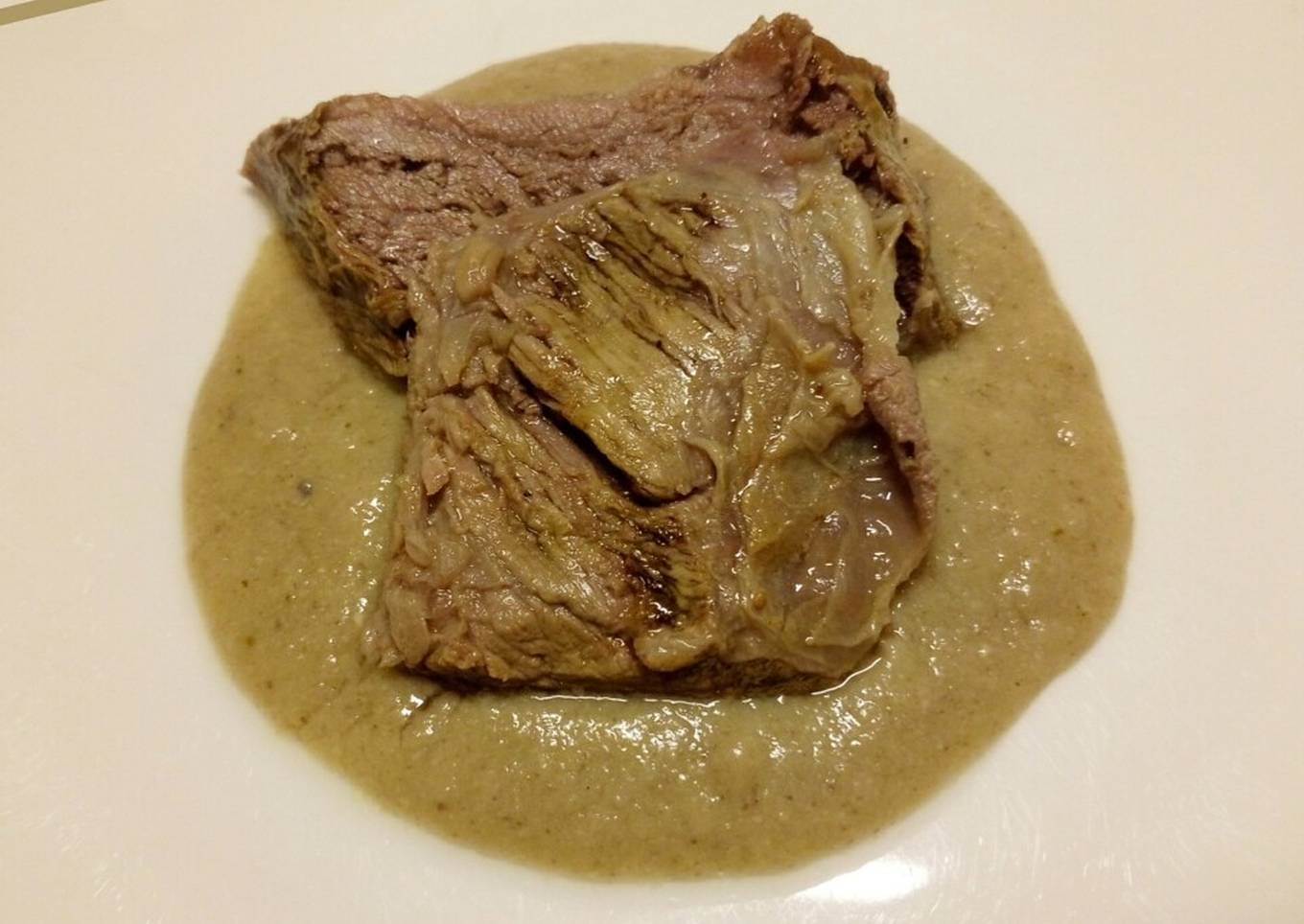slow roasted beef with bread and mushroom sauce