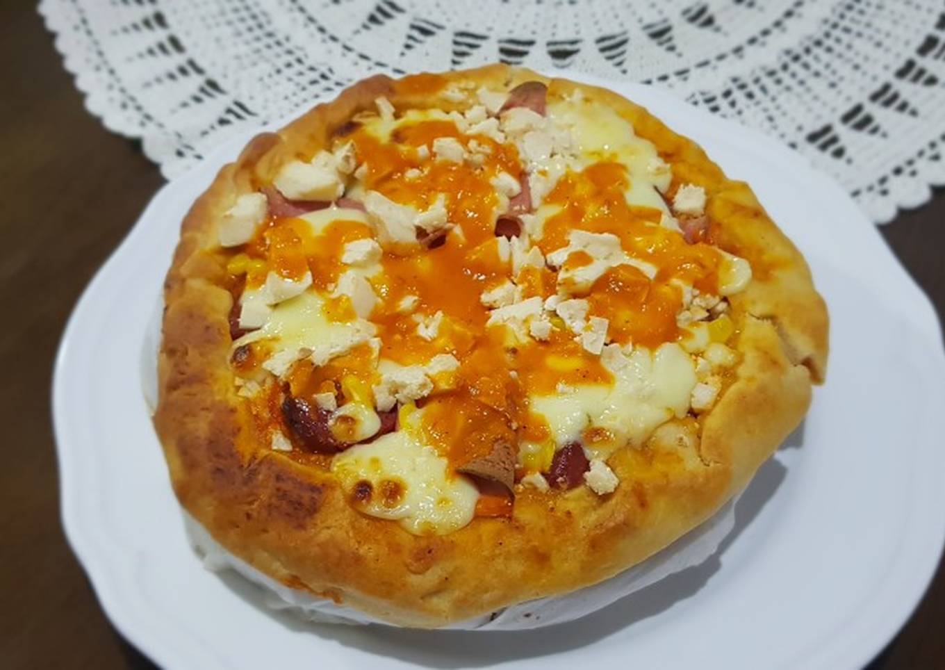 pizza covered with homemade mozzarella cheese sausage